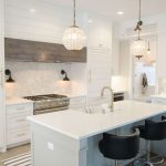 White countertop and cabinetry with sink