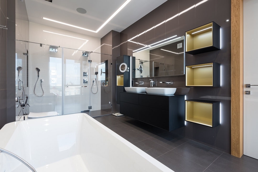 Bathroom with double sink and bathtub