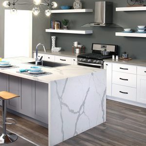 Marble COuntertop with White Cabinetry and hood oven