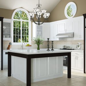 Kitchen with white cabinetry and refrigerator and decor on the countertop