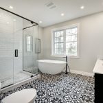 Canadian brand new bathroom with bathtub, sink, shower and toilet