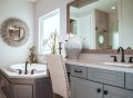 A creatively decorated small bathroom with budget-friendly accessories and storage solutions.