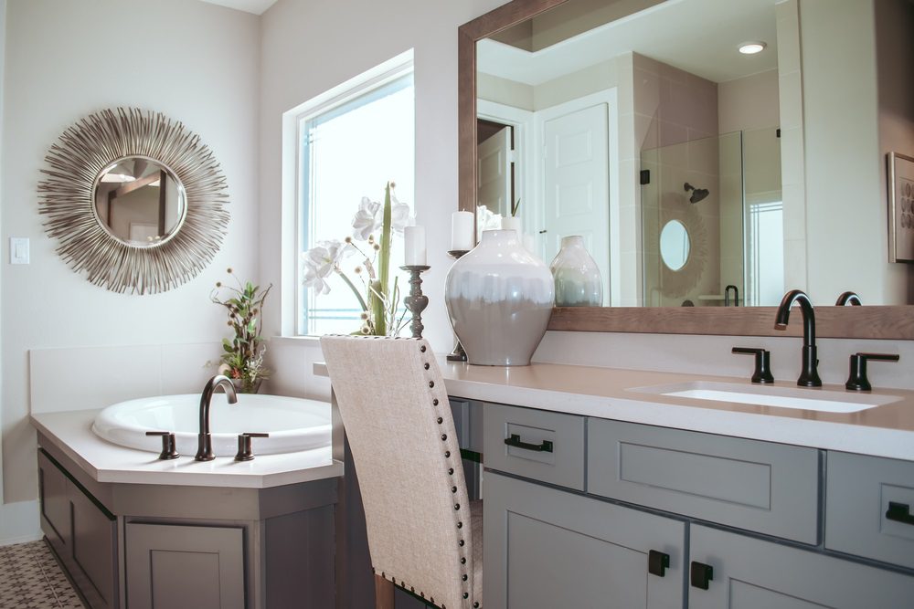 A creatively decorated small bathroom with budget-friendly accessories and storage solutions.