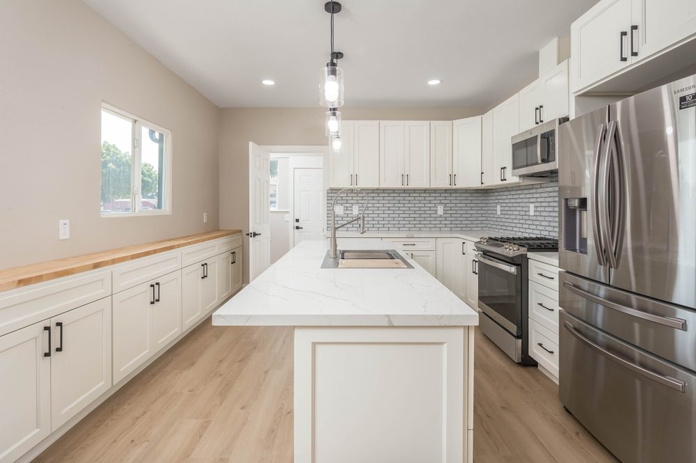 Beautifully refaced kitchen cabinets with a modern design.
