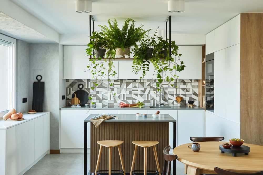 Modern kitchen island with wood and tile back panel design.