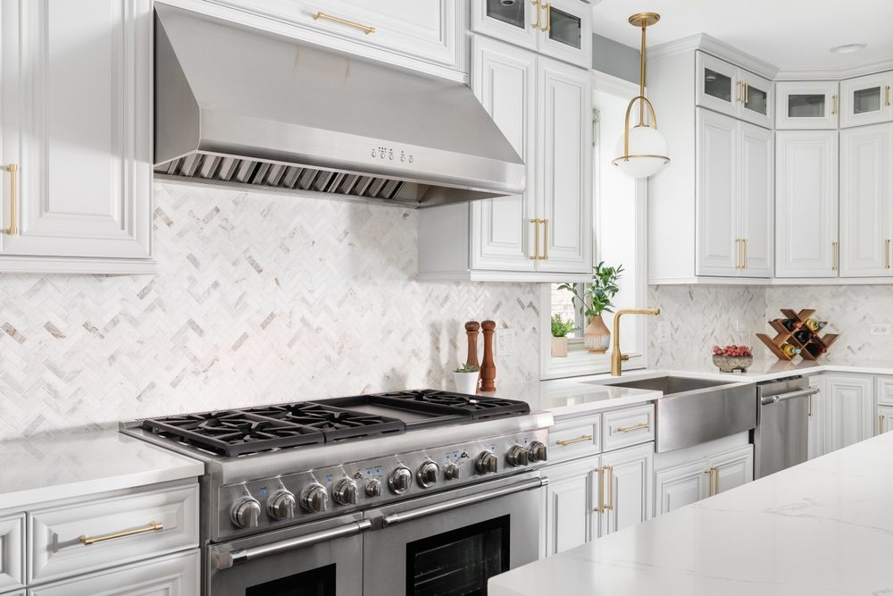 Modern backsplash in a small kitchen with subway tiles and a simple design