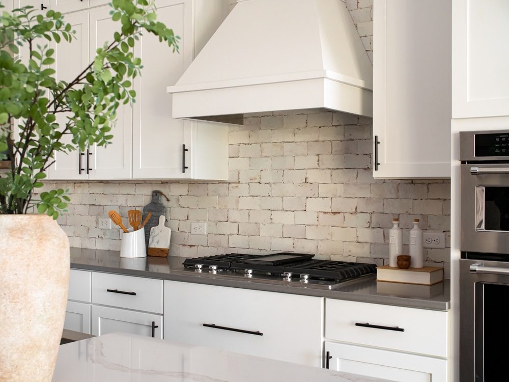 Modern backsplash in a small kitchen with subway tiles and a simple design