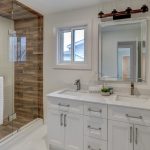 Modern master bathroom layout with freestanding tub, double vanity, and walk-in shower in 2025 design style.