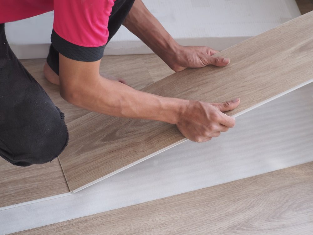 Vinyl plank flooring installation in a modern home