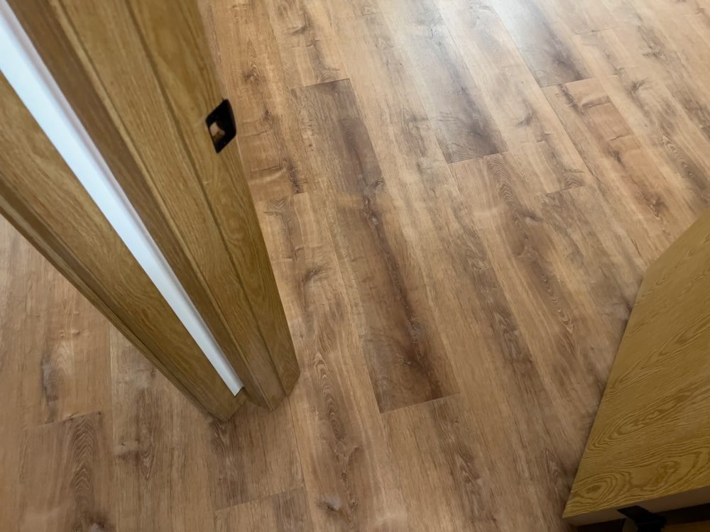 Vinyl plank flooring installation in a modern home