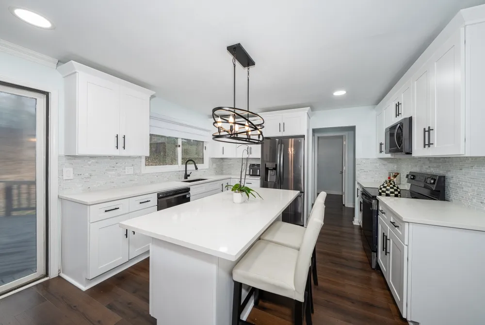 Kitchen island floor plan showing clearances to cabinets, appliances, seating and a main walkway.
