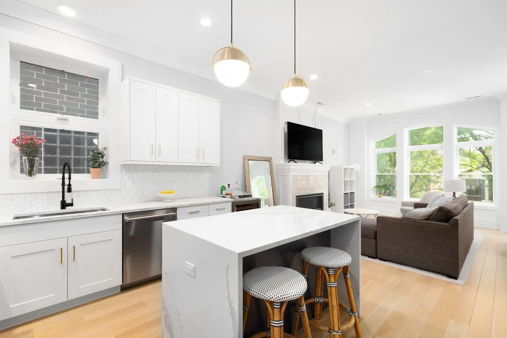 Kitchen island floor plan showing clearances to cabinets, appliances, seating and a main walkway.