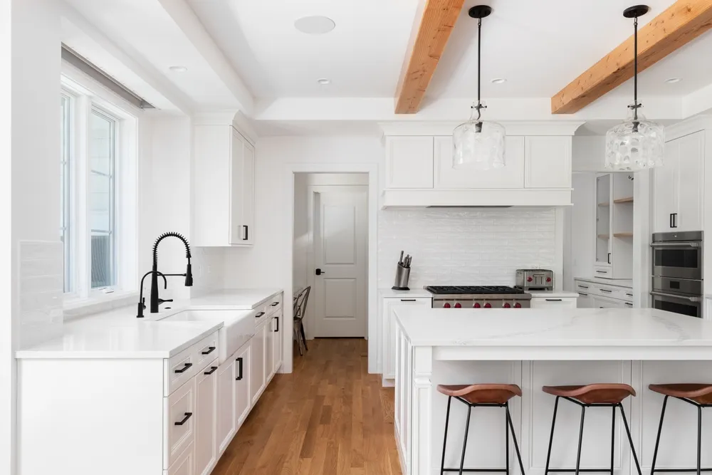 Kitchen island floor plan showing clearances to cabinets, appliances, seating and a main walkway.