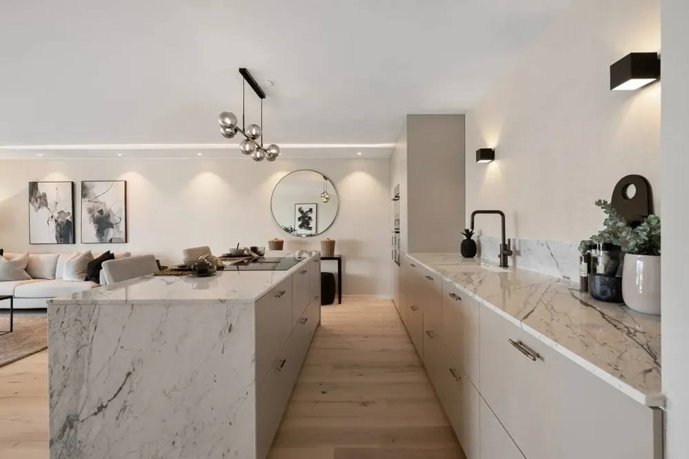 Kitchen island floor plan showing clearances to cabinets, appliances, seating and a main walkway.